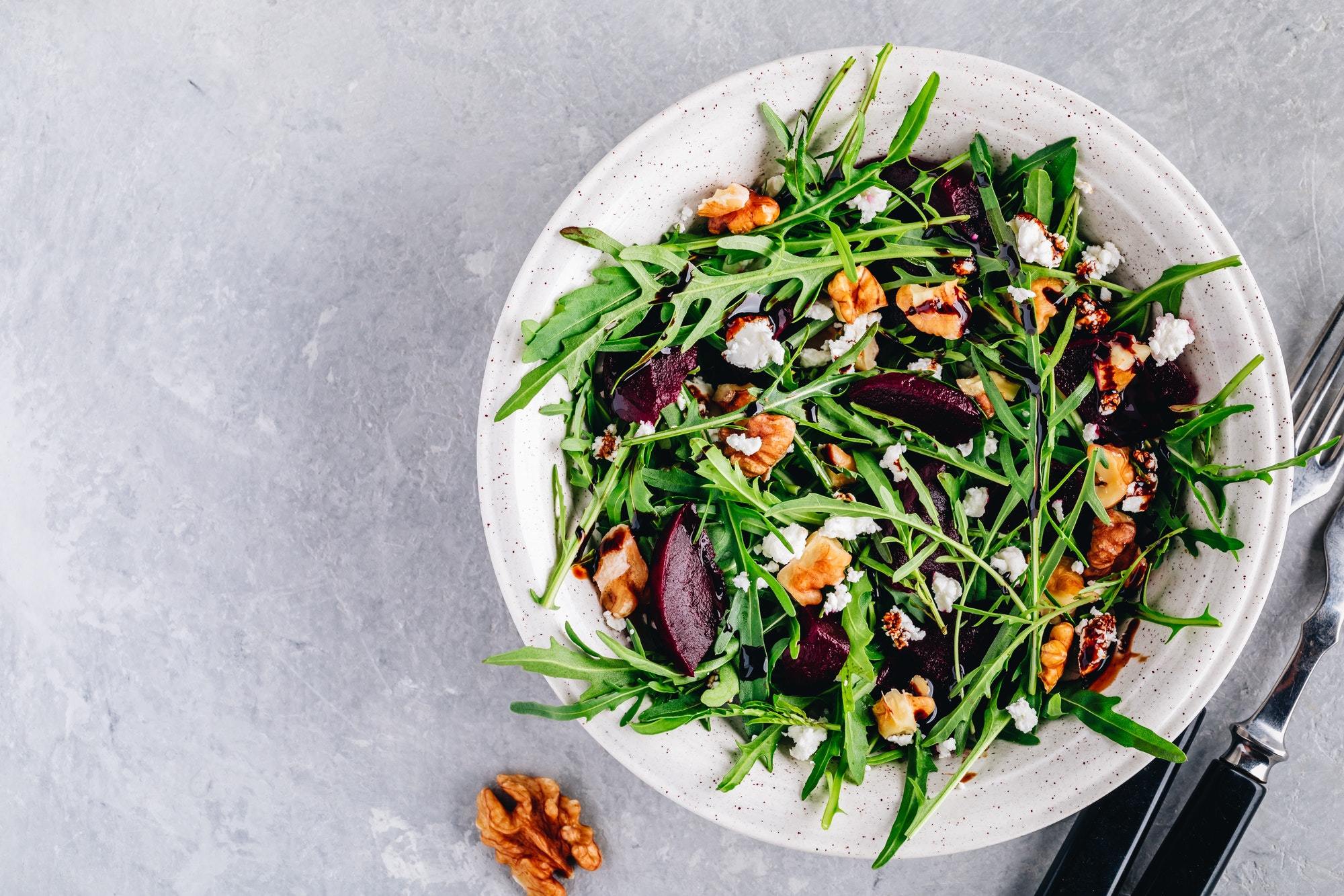 Arugula beet salad with goat or feta cheese and walnuts