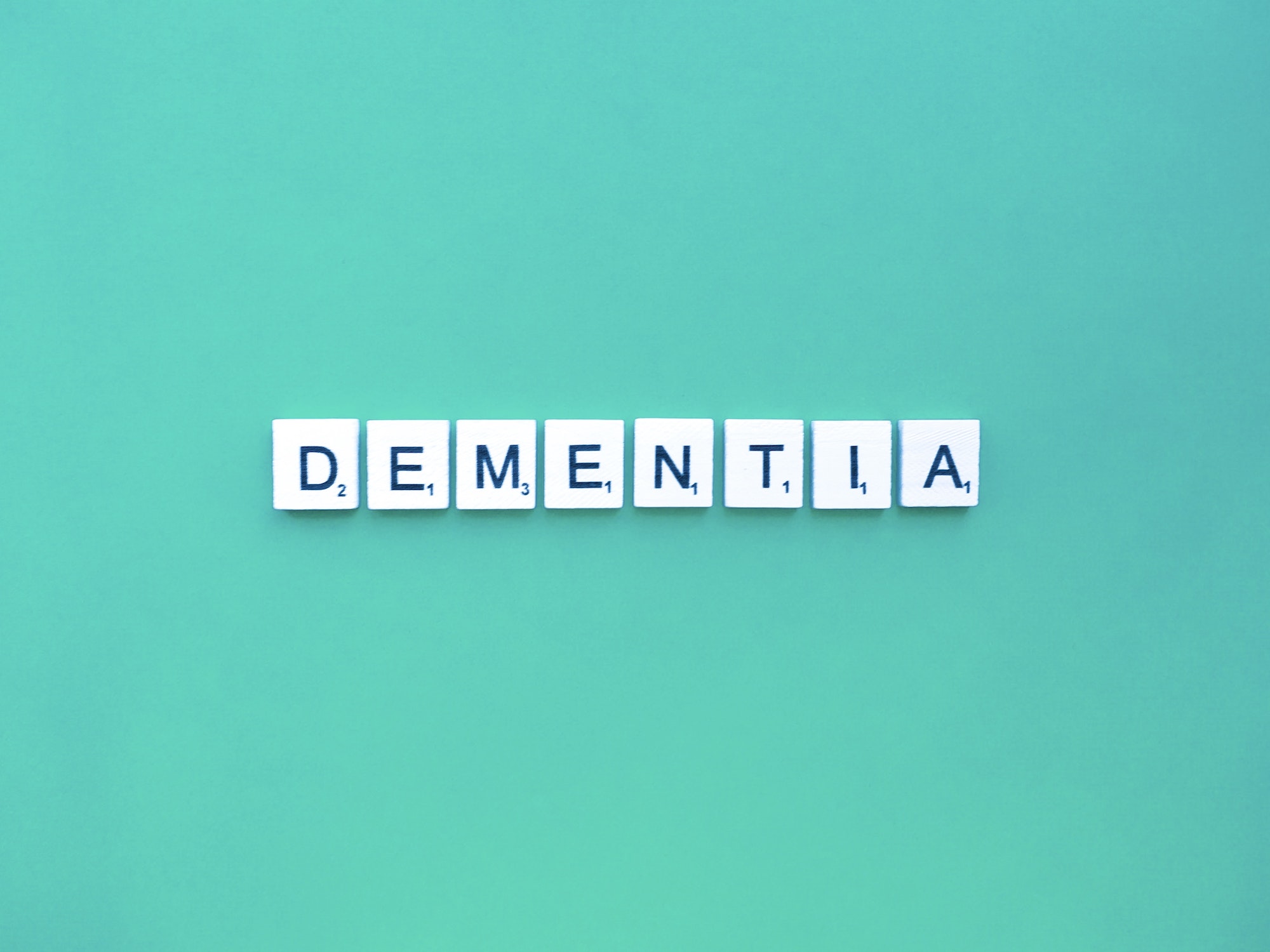 Dementia letters word on a green background