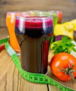 Juice beet and vegetable on board